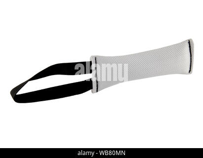 Baumwoll Seil Spielzeug für Hund auf weißem Hintergrund. Es ist für die Ausbildung der Hunde zu beißen und Straftäter halten. Das Spielzeug ist eine Rolle und trägt ein Armband. Stockfoto