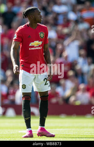 MANCHESTER, England - 24. August: Aaron Wan-Bissaka von Manchester United Reaktion während der Premier League Spiel zwischen Manchester United und Crystal Palace im Old Trafford am 24. August 2019 in Manchester, Vereinigtes Königreich. (Foto von Sebastian Frej/MB Medien) Stockfoto