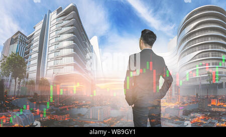 Asiatische Geschäftsleute in der Stadt mit morgen Licht und Lager graph, Investor Konzept. Stockfoto