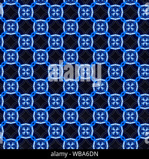 Interessanten Formen und Farben schaffen ein symmetrisches Design Pattern, die nahtlos zur Verwendung als Textil- oder Gewebe oder ein Wallpaper Hintergrund gefliest werden kann Stockfoto