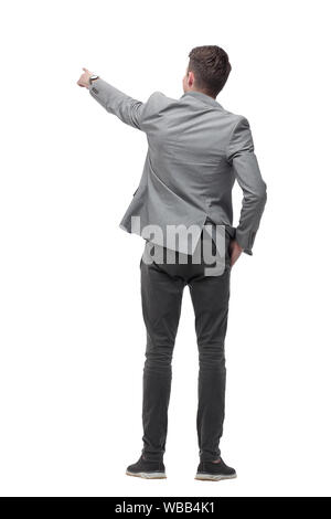 Ansicht der Rückseite. Ein junger Mann, der auf einem großen leeren Bildschirm. Stockfoto