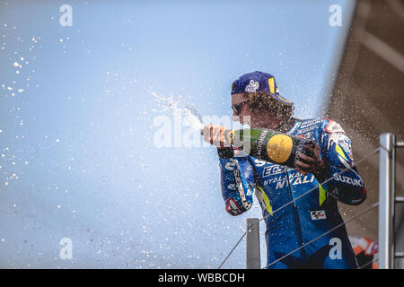 Alex Rins Champagner auf dem Podium, Ecstar Suzuki, Silverstone MotoGP, Silverstone 2019 GoPro britischen Grand Prix Stockfoto