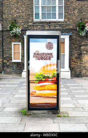 Burger King Werbung Plakat auf British Telecom öffentliches Telefon Kiosk Stockfoto