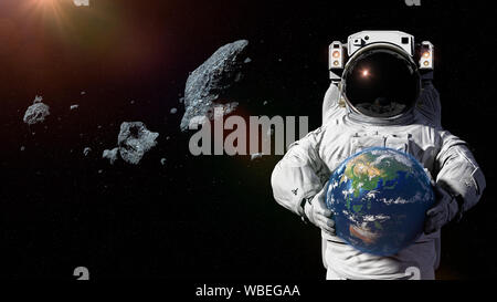 Astronaut Schutz des Planeten Erde von Asteroiden mit Asien, Ozeanien und Australien Stockfoto