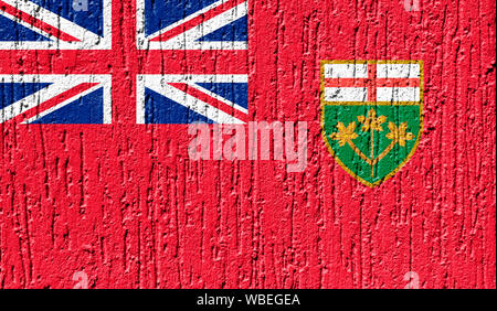 Flagge Ontario schließen bis auf ein gerissenes Wand gemalt Stockfoto