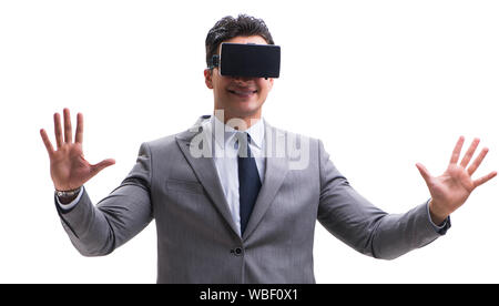 Der Unternehmer trägt die virtuelle Realität VR-Brille isoliert auf weißem Stockfoto