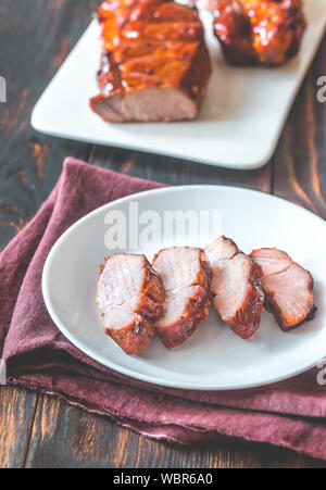 Teil der Char siu Schwein - Chinesisches bbq Schweinefleisch Stockfoto