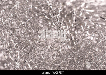Silber Reinigung Küche schwamm Makro isoliert Stockfoto