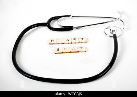Medizinisches Konzept mit einem stehoscope und die Nachricht Herzschlag Stockfoto