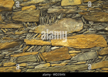 Felsen Textur in Golden, graue Töne als Hintergrund verwendet werden Stockfoto