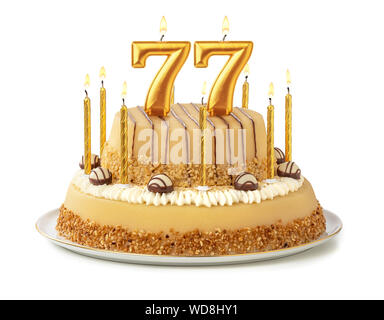 Festliche Kuchen mit goldenen Kerzen - Nummer 77 Stockfoto