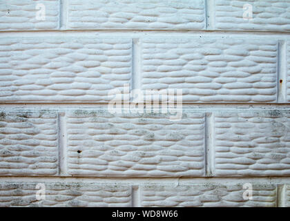 Nahaufnahme einer Betonwand, weiß lackiert Stockfoto