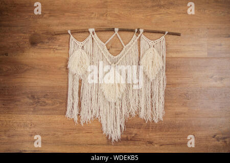 Handgefertigte macrame Wandbild an der Wand hängen Stockfoto
