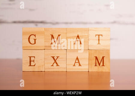 GMAT. Graduate Management Admission Test oder Prüfung in Holzblock Buchstaben Stockfoto