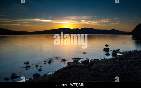 Sonnenuntergang über Loch Lomond Stockfoto