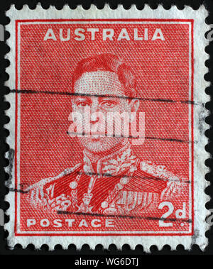 Stempel gedruckt in Australien zeigt Porträt von König George VI (1895-1952), Serie, ca. 1938. Stockfoto