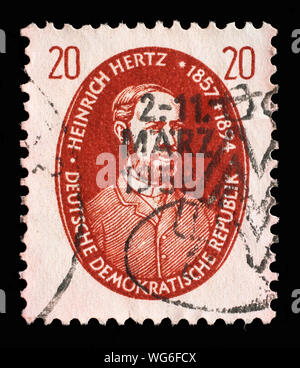 Stempel ausgestellt in Deutschland - Demokratische Republik (DDR) zeigt Heinrich Rudolf Hertz, berühmte Personen Serie, ca. 1957. Stockfoto