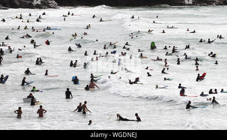 Surfen Strand Blick auf Polzeath, an der Nordküste von Cornwall Stockfoto