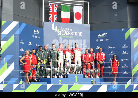 Silverstone, Großbritannien. 01 Sep, 2019. GTE am Podium mit L-R #2 ASTON MARTIN RACING drivers Darren Turner, Paul Dalla Lana & Ross Gunn, #1 AF CORSE Ferrari, Francois Perrodo, Emmanuel Collard & Nicklas Nielsen und #3 HERR RACING FERRARI 488 GTE EVO von Motoaki Ishikawa, Olivier Beretta & Kei Jörger während der FIA World Endurance Championship auf dem Silverstone Circuit, Silverstone, England Gefahren am 1. September 2019. Foto von Jurek Biegus. Credit: UK Sport Pics Ltd/Alamy leben Nachrichten Stockfoto