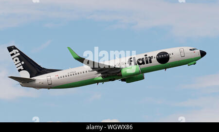 Flair Airlines Flugzeug Boeing 737-800 Jet Airliner kostengünstige Kanadische Fluggesellschaft Fluggesellschaft Airborne neue livery Logo Stockfoto