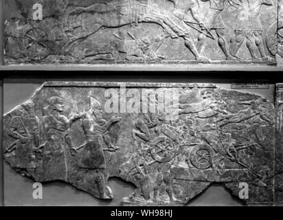 Alten Kriegsführung/Fording ein Fluss mit demontierten Wagen, Entlastung von palace Assurnasirpal II., Nimrud. 883-859 v. Chr. Stockfoto