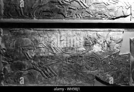 Kriegsführung/Fording ein Fluss mit demontierten Wagen. Befreiung von palace Ashurnsirpal II., Nimrud, 883-859 v. Chr. Stockfoto