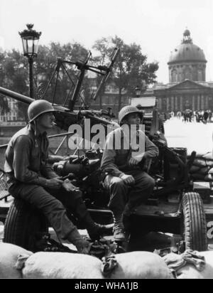 WW2: Befreiung von Paris, August 1944. Alliierte Truppen in den Straßen. Stockfoto