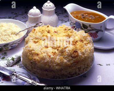 Italienische Küche. . Timballo.. Reis Timbale. Stockfoto