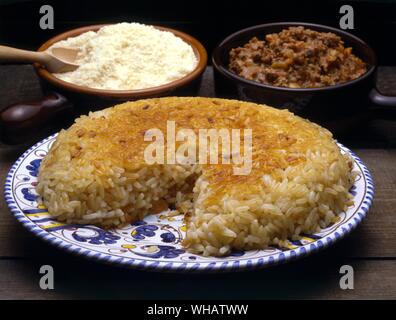 Italienische Küche von Robin Howe. . Riso Al Salto.. Gebratene übrig gebliebenen Reis. Stockfoto