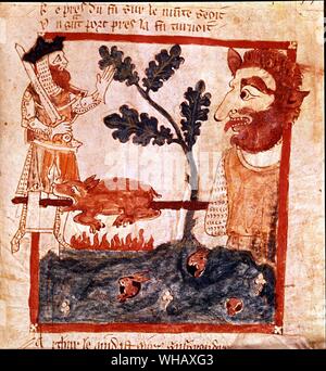 König Arthur erfüllt die Riesen auf dem Mount St. Michael Rösten ein Schwein am Spieß. 13. Jahrhundert. Stockfoto