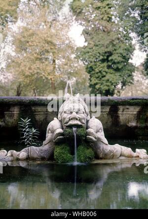 Die Gewässer von Rom durch H. v. Morton. Grotesker Kopf von der Piazza Navona, jetzt in den Gärten der Villa Borghese. Pl. 34, S. 218. . Stockfoto