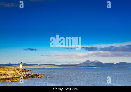 Ozean Küste Leuchtturm in Port Charlotte, Schottland, Vereinigtes Königreich Stockfoto