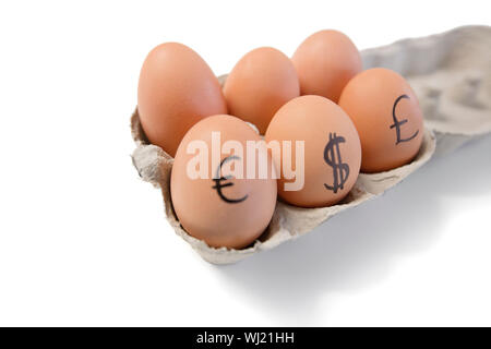 Eiern mit Währungssymbole drauf Stockfoto