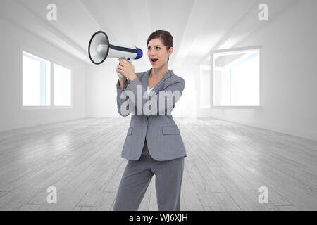Zusammengesetztes Bild der Geschäftsfrau mit Lautsprecher Stockfoto