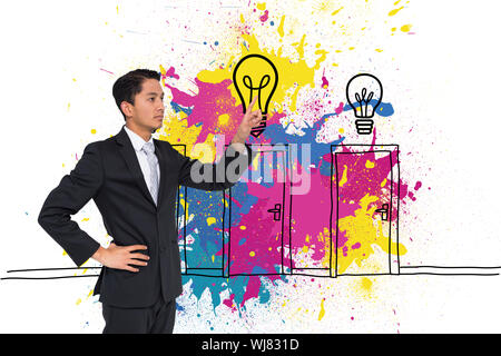 Zusammengesetztes Bild von Ernst asiatischen Geschäftsmann zeigen Stockfoto