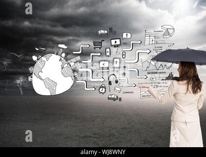 Zusammengesetztes Bild der eleganten Geschäftsfrau mit schwarzen Regenschirm Stockfoto