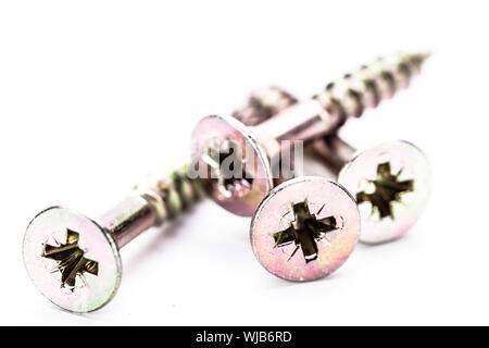 Silber Hardware Zimmerei diy Metall Stahl Makro Schrauben isoliert Stockfoto