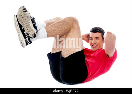 Fitness Kerl dabei knirscht Stockfoto