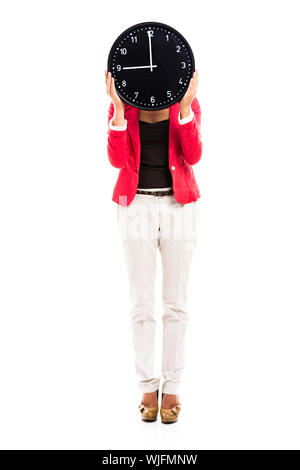 Business-Frau, die eine große Uhr an den Händen halten Stockfoto