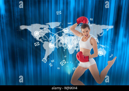Motiviert fit Braunhaarige Modell in Sportkleidung gegen futuristisch blau schwarz hintergrund springen Stockfoto