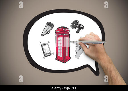 Hand mit einem Silver Pen gegen grauen Hintergrund mit Vignette Stockfoto