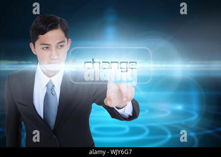 Das Wort ändern und mürrisch asiatische Geschäftsmann gegen futuristische glänzend schwarzen Hintergrund zeigen Stockfoto