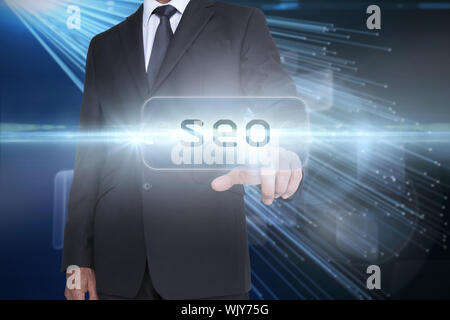 Das Wort seo und Geschäftsmann gegen abstrakte Technologie Hintergrund zeigen Stockfoto