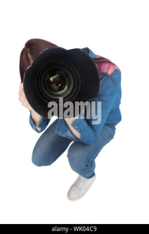Erhöhte Ansicht des jungen Fotografen, die Aufnahme der Kamera Stockfoto