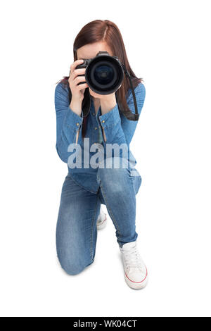 Hübsche junge Fotografen unter Bild der Kamera Stockfoto