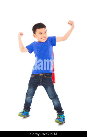 glückliches Kind super Helden imitieren Superman-pose Stockfoto