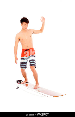 junge Surfer Praxis Surfen pose Stockfoto