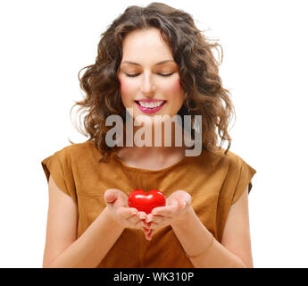 Schönheit junge Frau mit Valentine Herz in ihren Händen Stockfoto