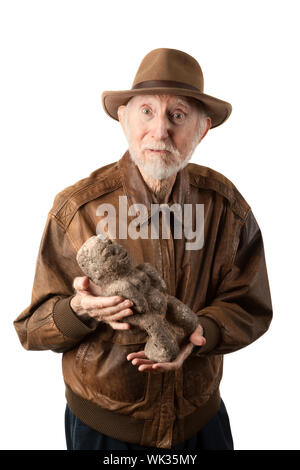 Abenteurer oder Archäologe in braune Lederjacke mit idol Stockfoto