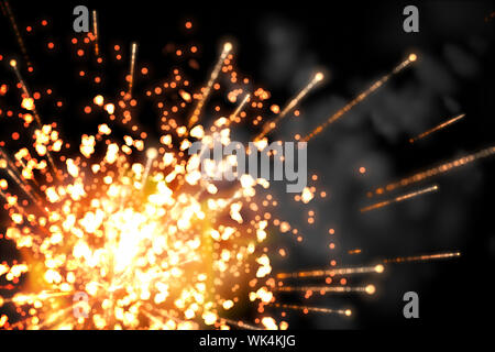 Digital erzeugten hell Feuerwerk Design auf Schwarz Stockfoto
